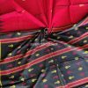 Vibrant and festive cotton kotpad saree with tribal-inspired designs