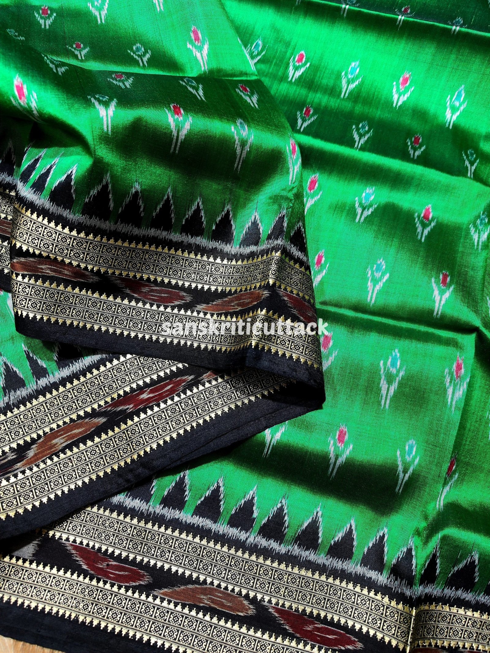 Handwoven Khandua Pata saree with peacock motifs