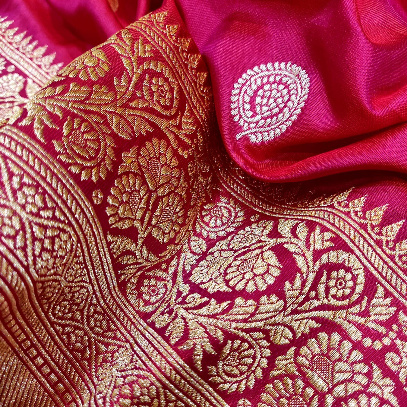 Rani Pink Katan Silk Handwoven Saree with Intricate Zari Booties and Floral Border