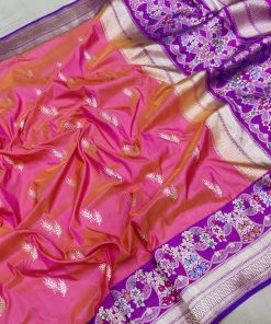 Elevate your ethnic wear game with this exquisite orange pink katan silk kadwa Banarasi saree, adorned with silver and gold zari booties and a designer multicolor resham meenakari contrast skirt border. Shop now and make heads turn at any occasion!