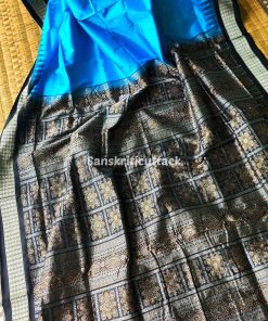 handloom Bomkai silk saree, traditional Odisha saree, authentic Bomkai silk, Bomkai pata saree, handloom silk saree, Odisha handloom saree, copper sulfate Bomkai saree, saree for special occasions, Bomkai silk saree with blouse, black border saree, elegant handloom saree, silk saree for festive wear, designer Bomkai saree, black pallu Bomkai saree, traditional handloom Bomkai, copper sulfate saree for events, handcrafted Bomkai saree, saree for women, buy Bomkai silk saree, online Bomkai saree shopping, Odisha silk saree, saree with kumbha border, black and copper saree, premium Bomkai saree, wedding Bomkai silk, ethnic wear for women, luxury Bomkai silk