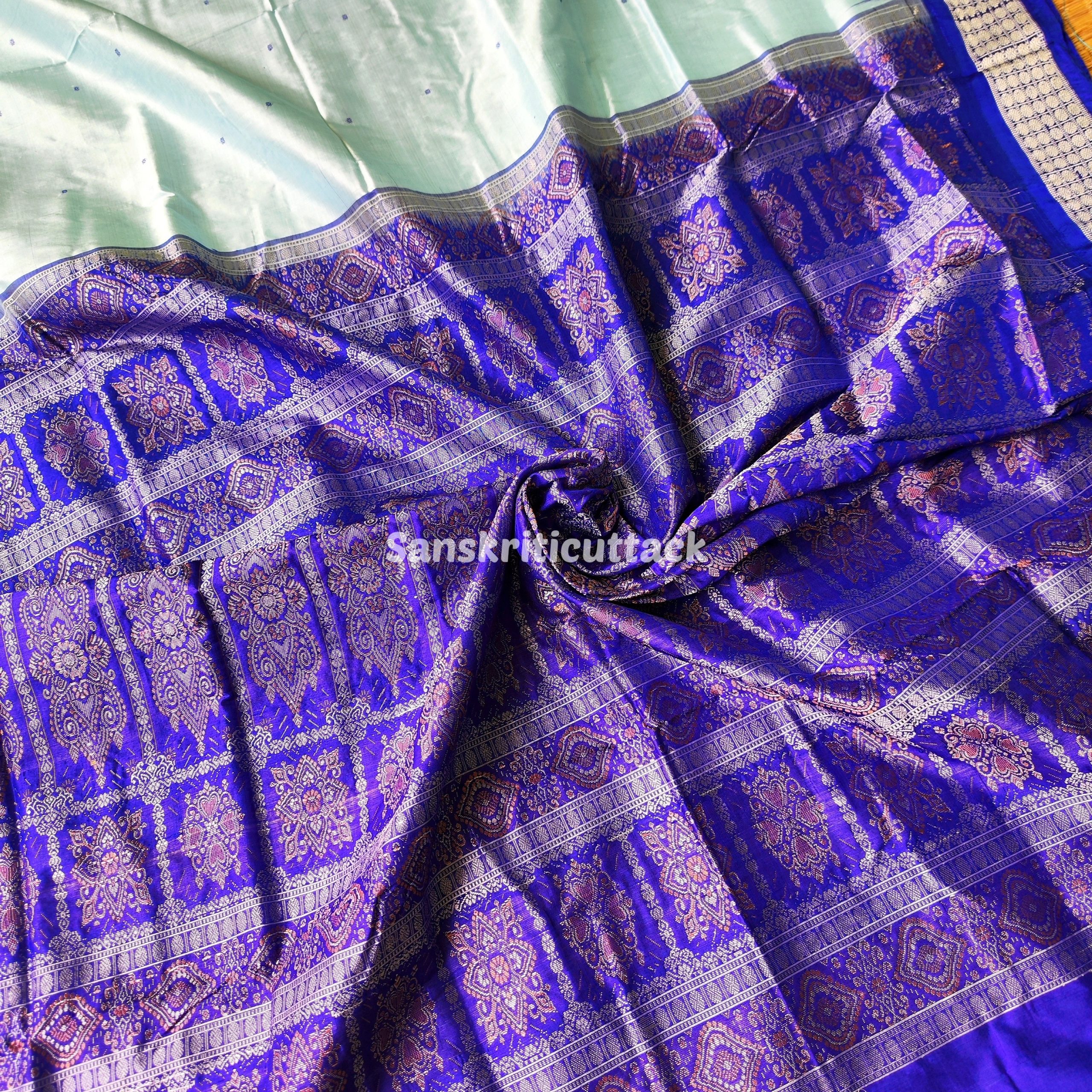 Photo_1731322246707 sea foam green saree, bomkai silk saree, Odisha handloom saree, handloom silk saree, traditional bomkai saree, green and blue saree, bomkai pata saree, silk saree from Odisha, bomkai silk pata saree, festive handloom saree, sea foam green saree online, buy bomkai saree, bomkai silk saree with blouse, traditional bomkai saree, sea foam blue saree, bomkai pata silk saree, elegant handloom saree, saree for weddings, sea foam silk saree, unique bomkai saree, buy handloom bomkai saree, odisha bomkai pata, silk saree bomkai, handcrafted bomkai saree, best bomkai saree, premium handloom silk, saree in sea foam green, bomkai saree online, buy traditional silk