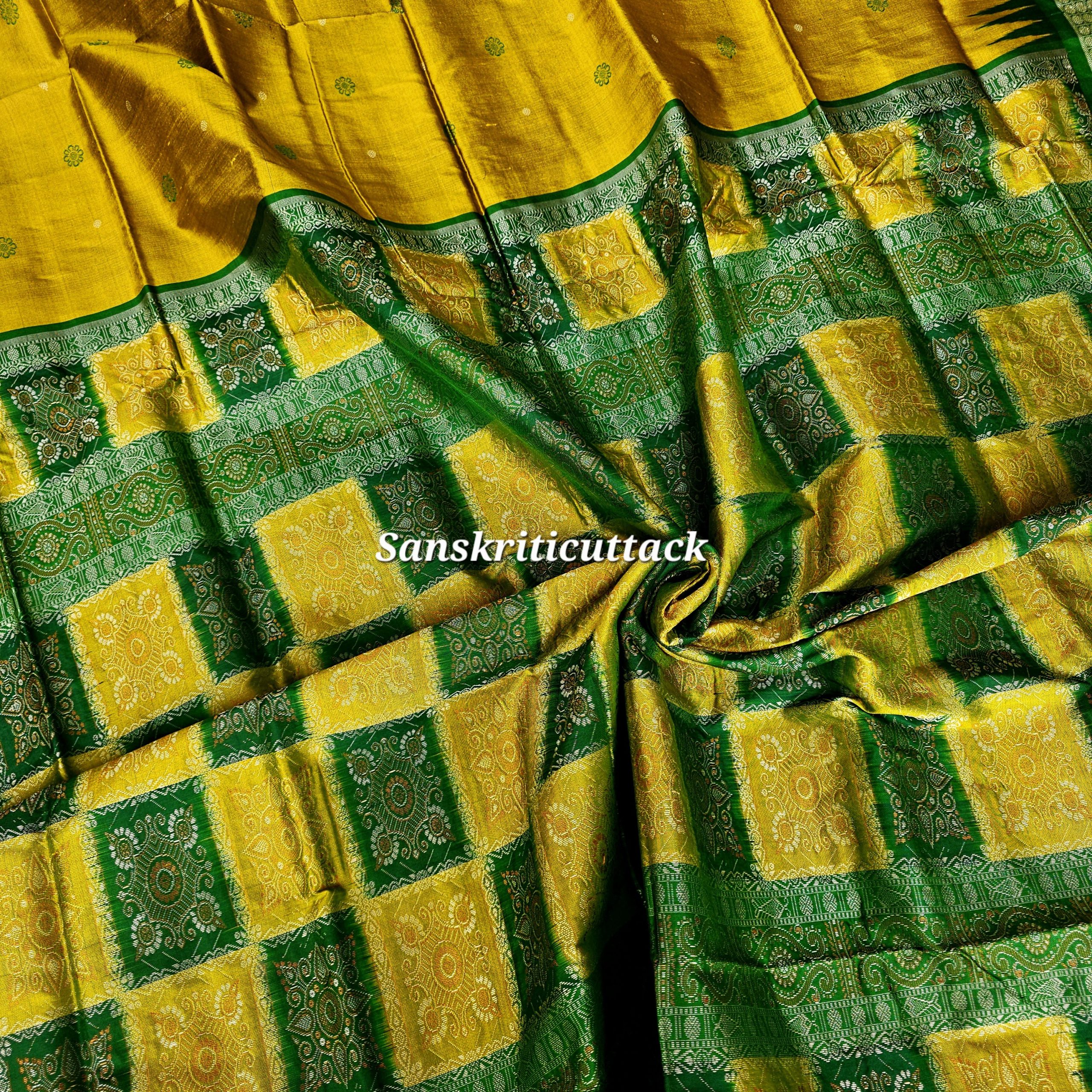20260204_160058(1) Luxury Bomkai handloom silk saree with golden body and green pallu, temple and rudraksha border, handcrafted in Sonepur Odisha by Sanskriti Cuttack