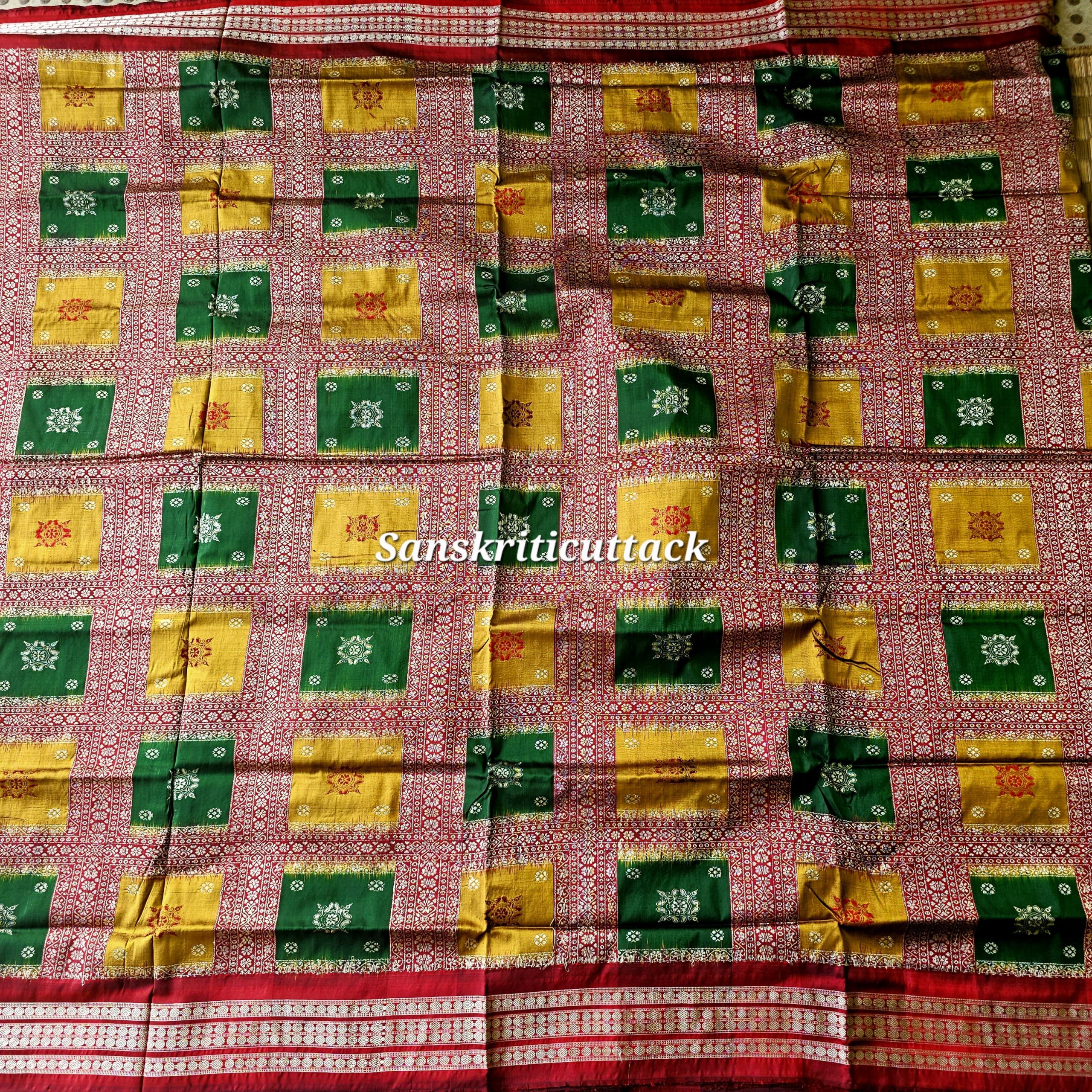 20260205_150944(1) Traditional Indian heritage silk saree with half body Bomkai motifs and contrast woven panels