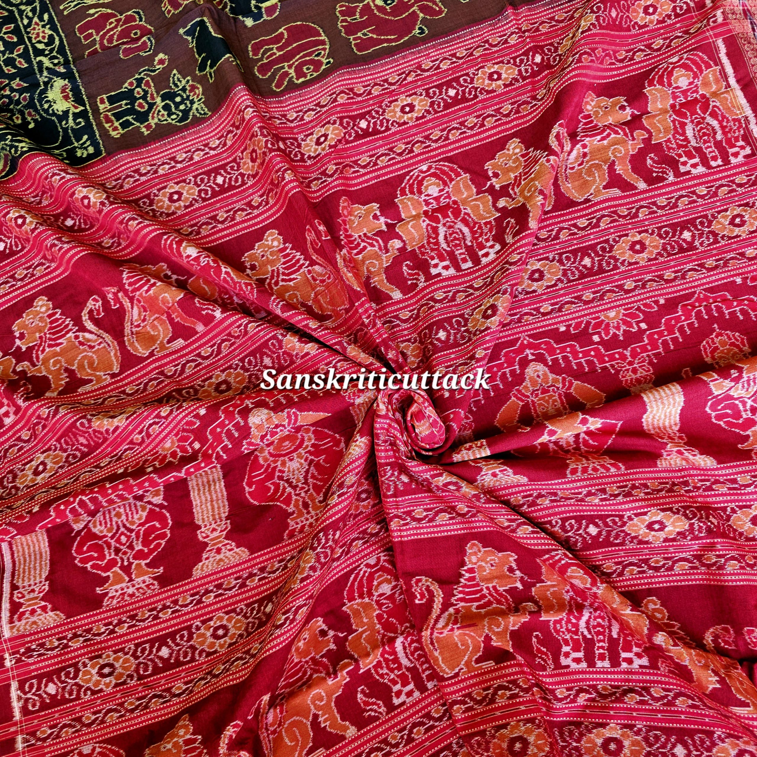 20260205_153449(1) Coffee Maroon Cartoon Ikat Sambalpuri Saree