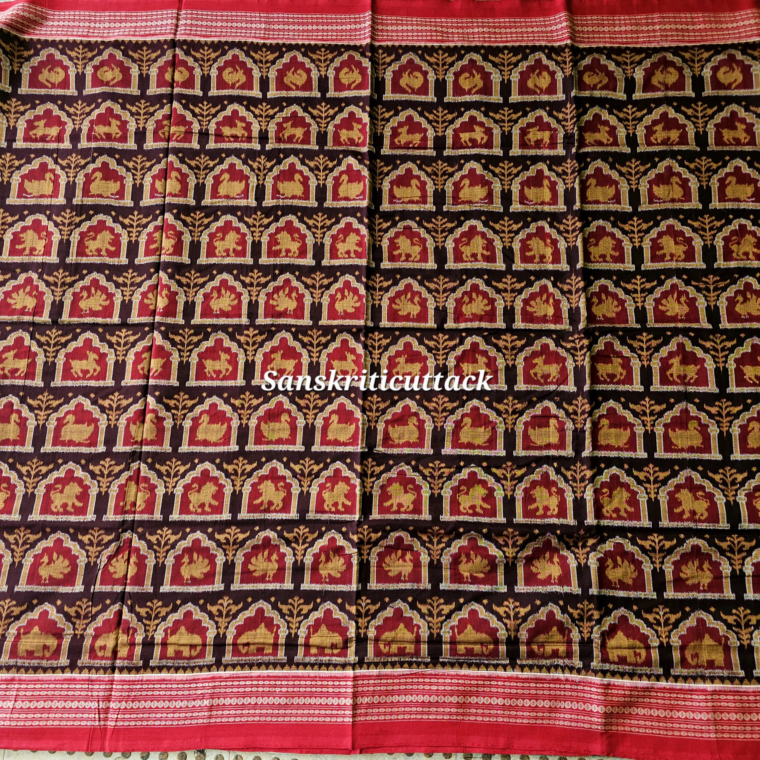 20260206_150714(1) Traditional double ikat cotton saree with lion peacock elephant motifs