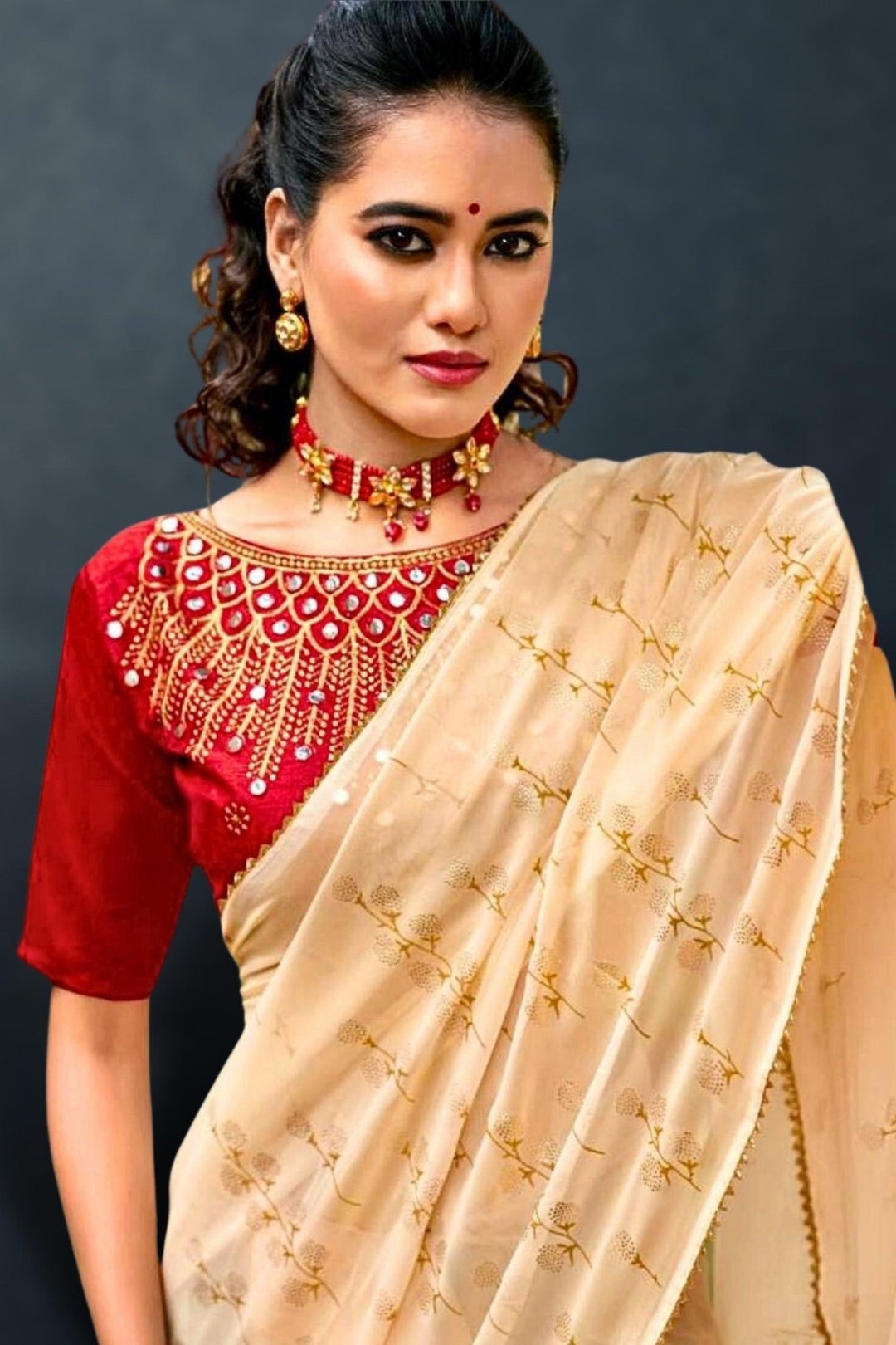 Contrast blouse design with traditional handloom saree
